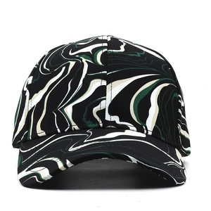 Front view of six-panel baseball cap with green and black marble tie-dye pattern texture