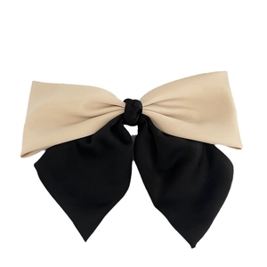 Elegant beige and black satin bow spring hair clip with minimalist French style design