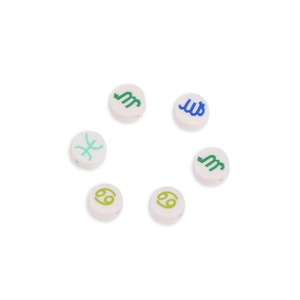 Colorful zodiac symbol beads on white polymer clay for DIY bracelet jewelry making