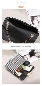 Macro detail of houndstooth crossbody bag showing internal capacity for phone and makeup