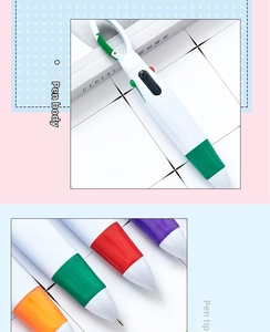 Detail view of colorful rubber grips and carabiner clips on multi-color plastic ballpoint pens