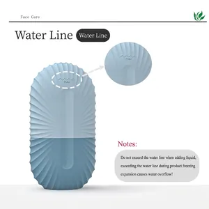 Face ice roller in blue silicone with non-slip texture and max water line for facial massage