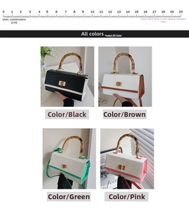 Detail of retro crocodile texture handbag featuring bamboo handles and gold twist locks