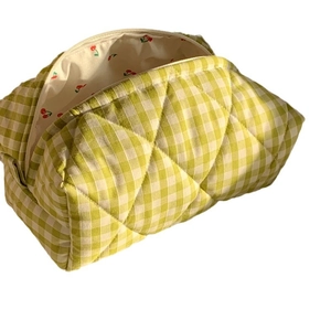 Green checkered quilted cotton makeup bag with red cherry lining and beige zipper