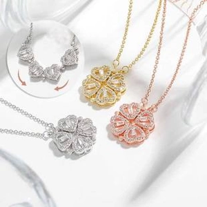 Detailed view of magnetic heart-to-clover necklace in silver, gold and rose gold