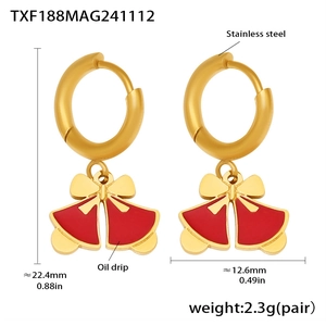 Detail view of bell earrings with red enamel and gold bow showing product dimensions