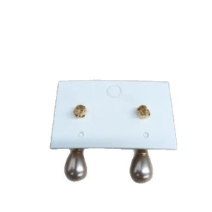 French retro waterdrop pearl earrings with textured gold studs on display card