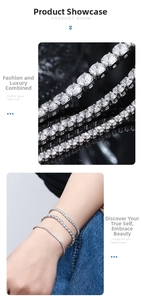 Close-up of three s925 silver tennis bracelets with clear cubic zirconia on denim background