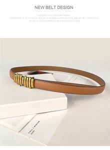 Close-up of brown litchi grain leather belt with vintage gold multi-joint metal buckle