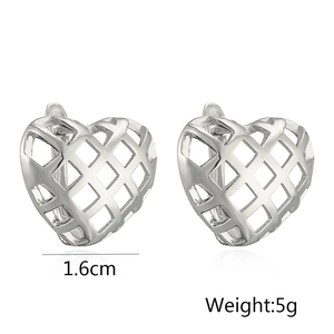 Detail view of silver hollow heart earrings showing dimensions 1.6cm and 5g weight