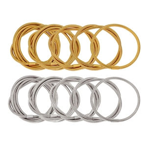 18K gold and silver plated flexible snake bone bracelet set with a layered metallic coil design