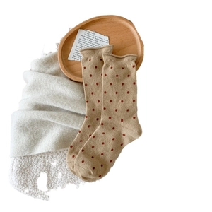 Elegant beige polka dot wool socks for women in a cozy vintage mid-calf crew style