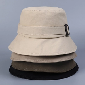 Stack of four cotton bucket hats in beige, khaki, army green and black with leather buckle