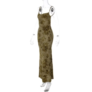 Close-up of vintage brown floral print and slim fit texture on long tie-dye dress