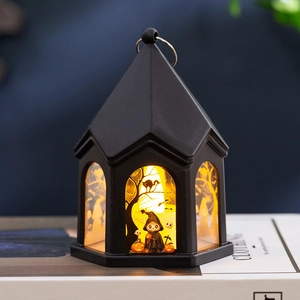 Lanterne LED d'Halloween noire avec motifs citrouille et lumière jaune chaude décorative