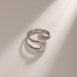 Minimalist silver S-shaped open ring made of stainless steel with polished finish