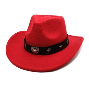 Detailed close-up of red felt cowboy hat featuring black belt with silver heart studs