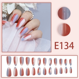 Gradient red and blue press-on nails set with long almond shape and glossy finish