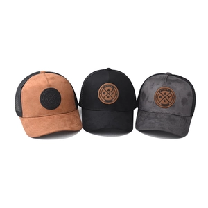 Three cotton trucker hats in caramel, black, and charcoal with circular ENJOY LIFE patches