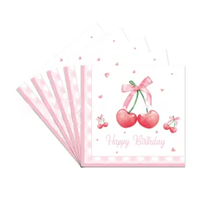 Detail of cherry theme napkins with pink gingham borders and Happy Birthday pattern