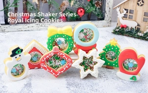 Detailed close-up of Christmas shaker cookies with festive designs and sugar pearls