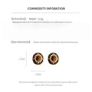 Detailed chart of vintage oval tiger eye and pearl earrings showing 2.7cm size and weight