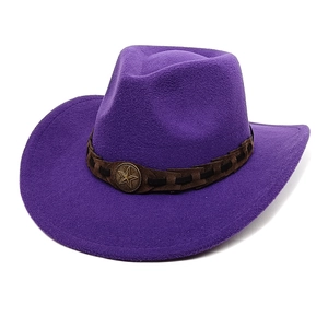 Detail of purple felt cowboy hat featuring braided leather band and star metal buckle