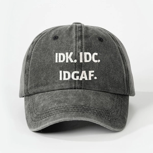 Retro washed cotton baseball cap featuring IDK. IDC. IDGAF. white embroidery text