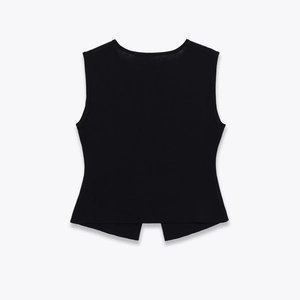 Women's black sleeveless knit top with split hem back view in street style fashion