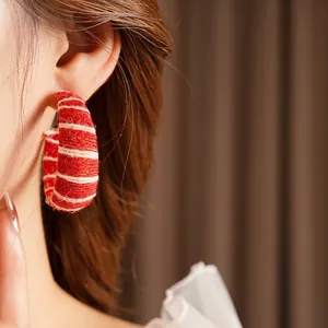 Minimalist red and white woven fabric hoop earrings with a trendy C-shape design for women