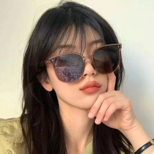Women's foldable oversized square sunglasses with brown frames and dark lenses