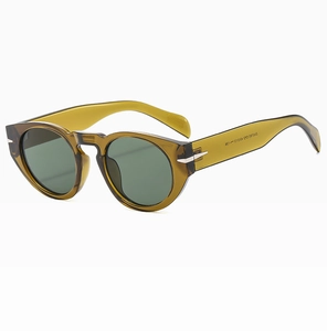 Detail view of olive green acetate sunglasses with silver arrow metal hinge accents