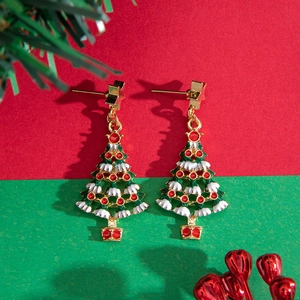 Creative Christmas tree alloy enamel earrings with star studs on festive background