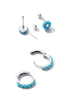 Close-up of S925 sterling silver flower earrings with turquoise beads and zircon details