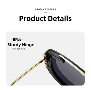 Detailed close-up of sturdy metal hinges on black oversized Y2K shield sunglasses