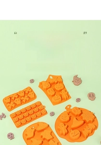Detail view of 5-piece orange silicone molds with pumpkin and ghost shapes for baking