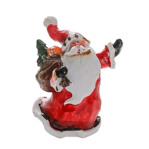 Vintage resin Santa Claus figurine in red and white for Christmas tabletop decoration