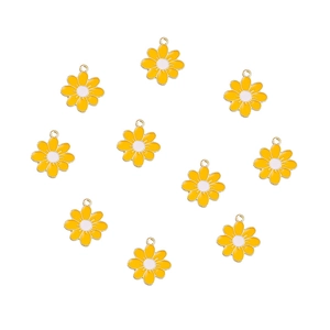 Detailed view of yellow daisy flower pendants with white centers for DIY jewelry making