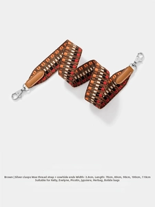 Detail of woven 3.8cm strap with geometric patterns and brown leather ends for handbags