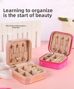 Mini portable PU leather jewelry box with multiple compartments for rings and necklaces
