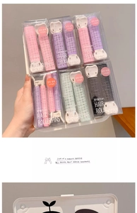 Macro view of colorful hair roller pins set with duckbill clips for volume styling