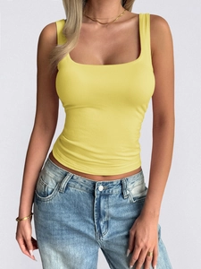 Detail view of yellow square neck sleeveless Y2K crop top tank on a model