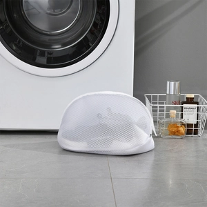 Thick mesh shoe laundry bag for washing machines in a modern clean laundry room