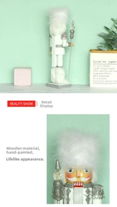 Detail of hand-painted white wooden nutcracker figure with silver scepter and fur hair