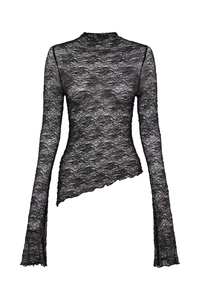 Détail du haut en dentelle noire transparente avec motifs floraux et ourlet asymétrique