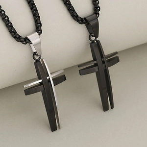 Minimalist hollow stainless steel cross pendants in black and silver on chains