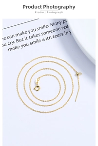 Detailed macro view of S925 sterling silver gold-plated chain with adjustable needle pin