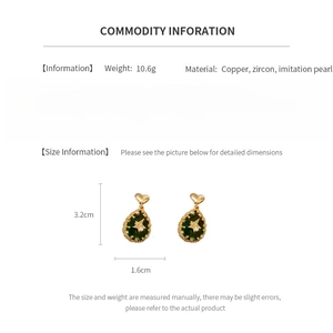 Detailed spec chart of copper heart and green teardrop earrings with size measurements