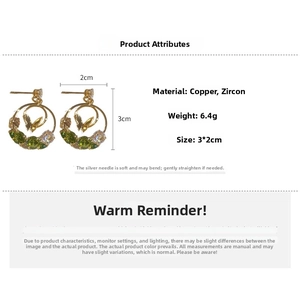 Detailed specs of butterfly hoop earrings featuring copper, zircon and green gemstones
