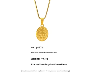 Detail of gold-plated stainless steel oval religious cross pendant with box chain